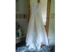 WEDDING DRESS,  This item is an ivory wedding dress the....
